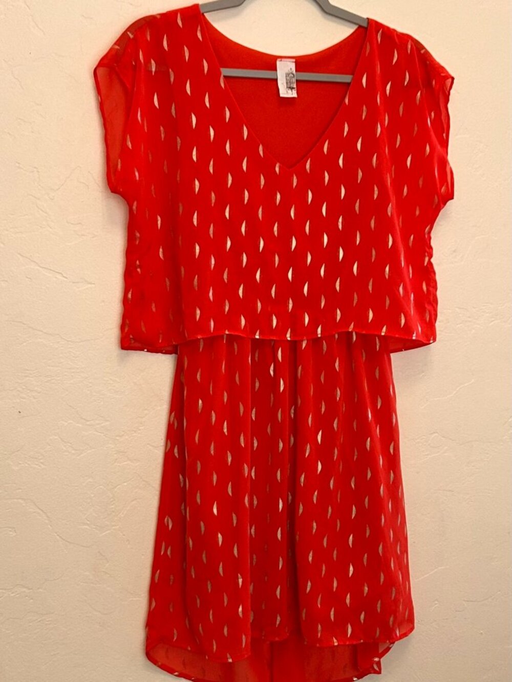 Anthropolgie dress, size S, orange with gold print pattern. Birdcage label